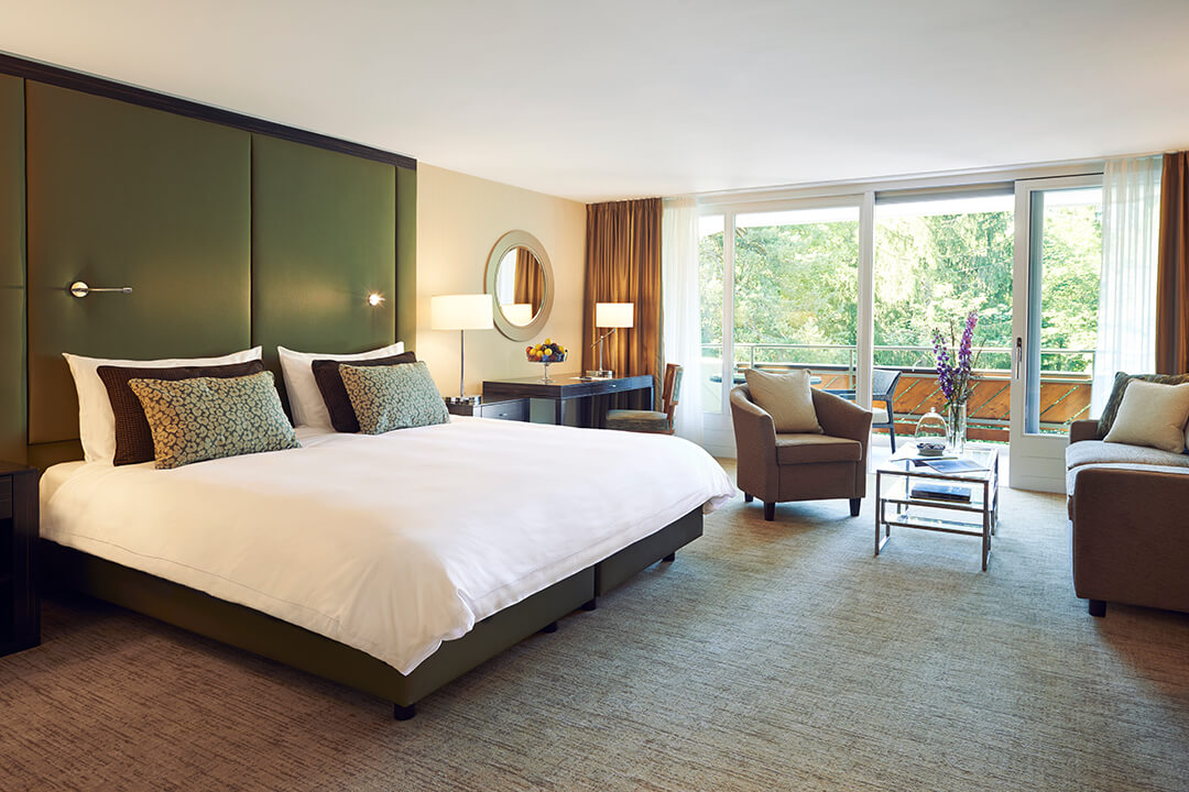 interior image of chalet belmont room with bed and view of outdoors