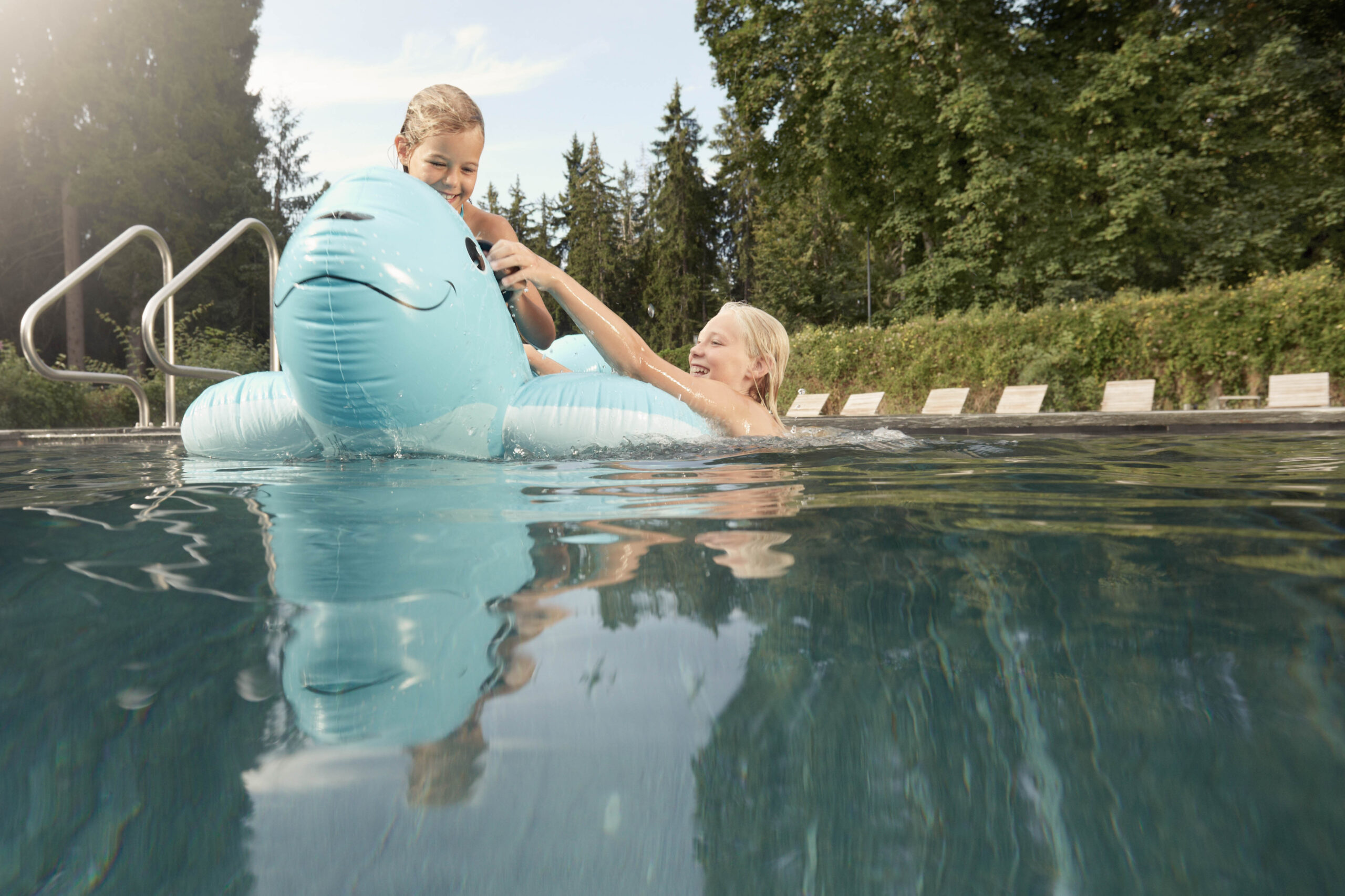 Kids in the pool of the Waldhaus Flims